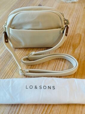 Lo & Sons Cream Crossbody Pouch with Adjustable Strap